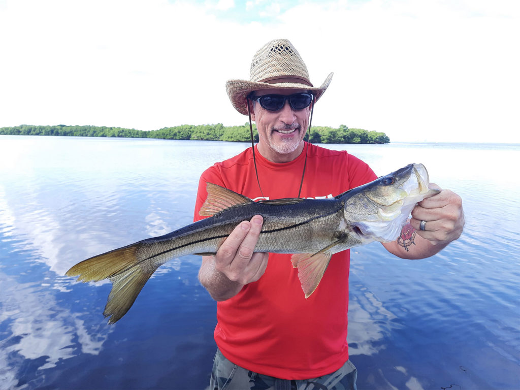 Anglers fishing at top Tampa Bay spots like Skyway Bridge and local piers